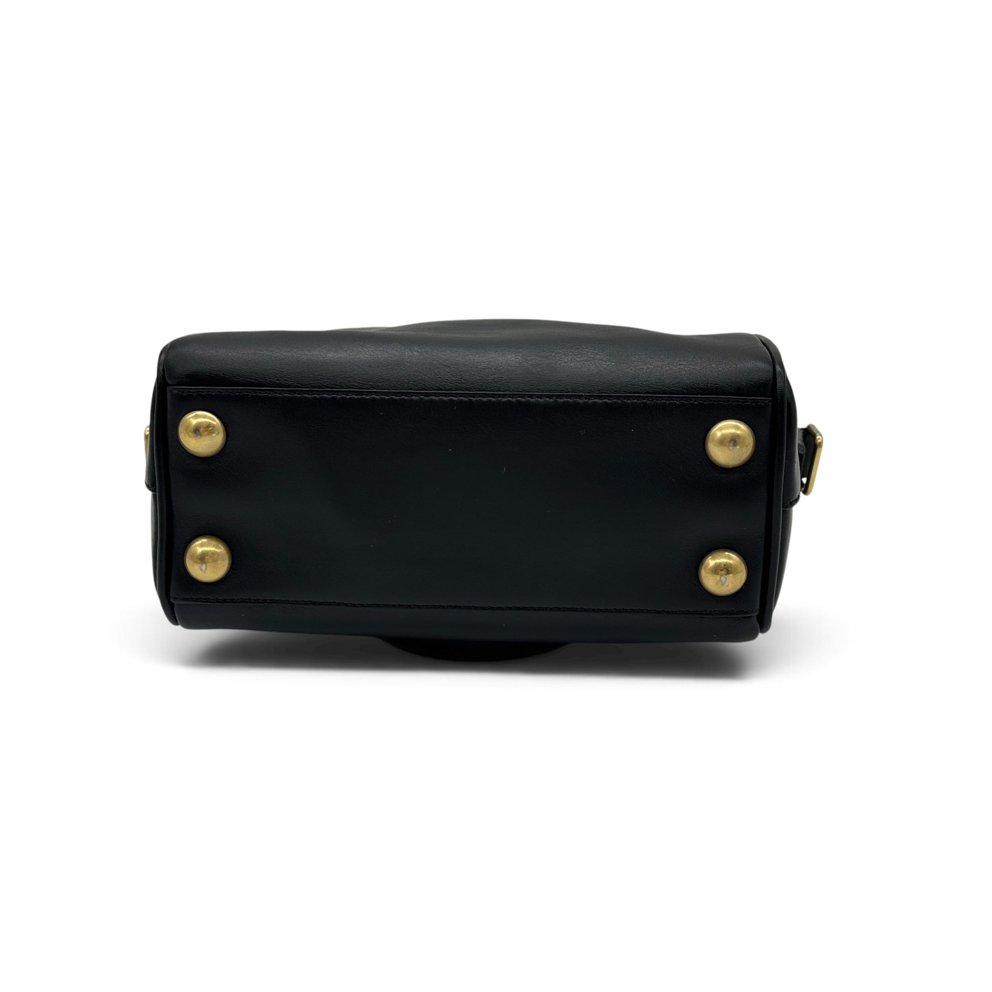 Base della borsa a mano Borse Vintage Saint Laurent in pelle nera con quattro piedini protettivi in metallo dorato