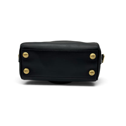 Base della borsa a mano Borse Vintage Saint Laurent in pelle nera con quattro piedini protettivi in metallo dorato
