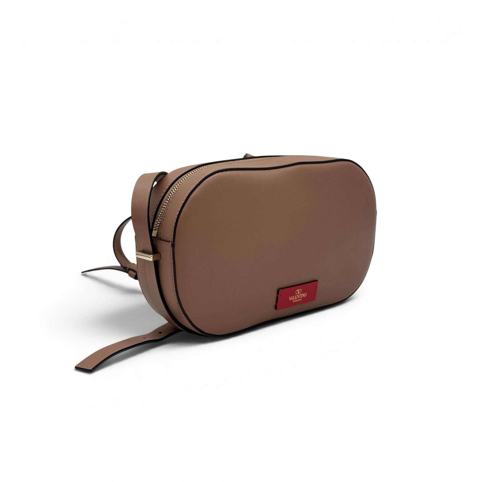 Borsa a tracolla Borse Vintage Valentino Garavani in pelle color nude con forma ovale e logo dorato su etichetta rossa